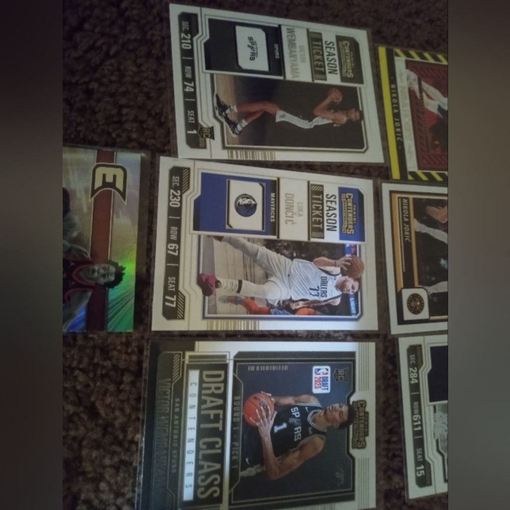 Lot of mint condition rookies...wemb, donic, jokic and Steph Curry